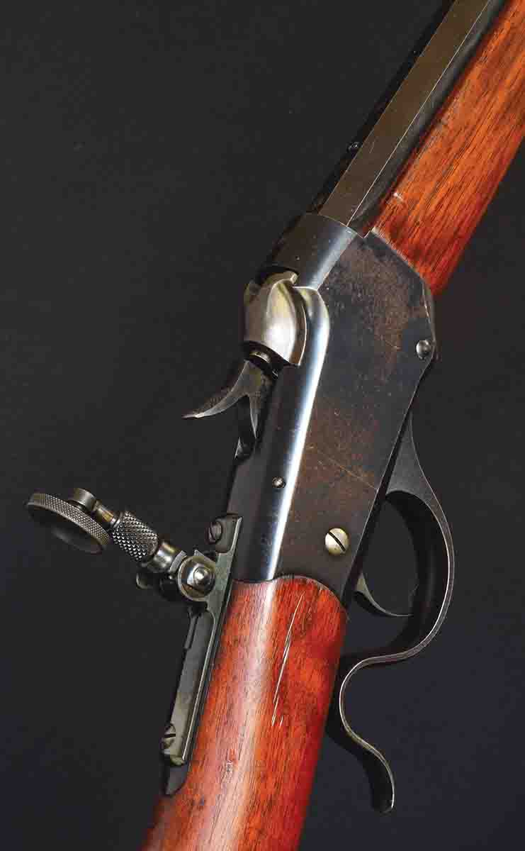 This Low Wall is chambered for the .22 Winchester Center Fire (WCF), introduced in 1885 as one of the original chamberings for the then-new, single-shot rifle. The tang sight is a Lyman.